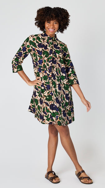 Model wearing "Larkspur" print Zuri dress with brown leather sandals.