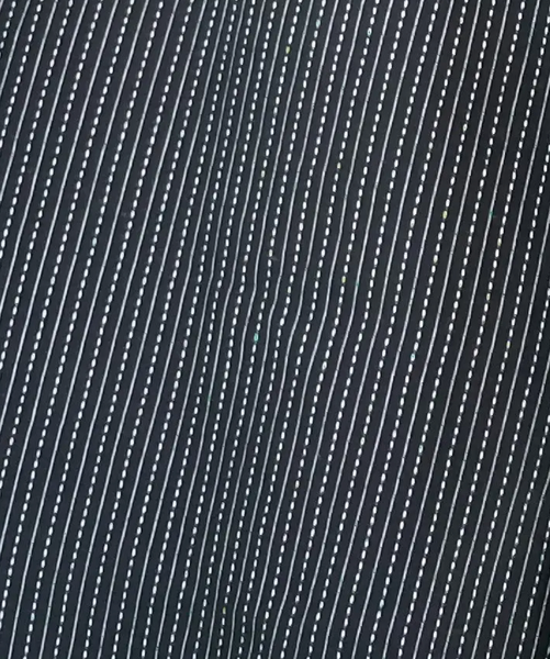 Close-up of "black tagai" fabric.
